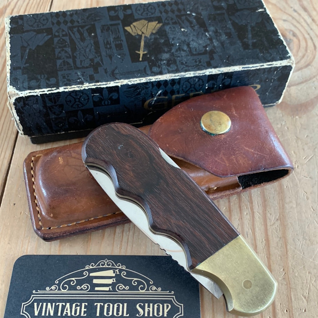 SOLD K18 Vintage GERBER USA folding MAGNUM HUNTER KNIFE with sharpening stone IOB