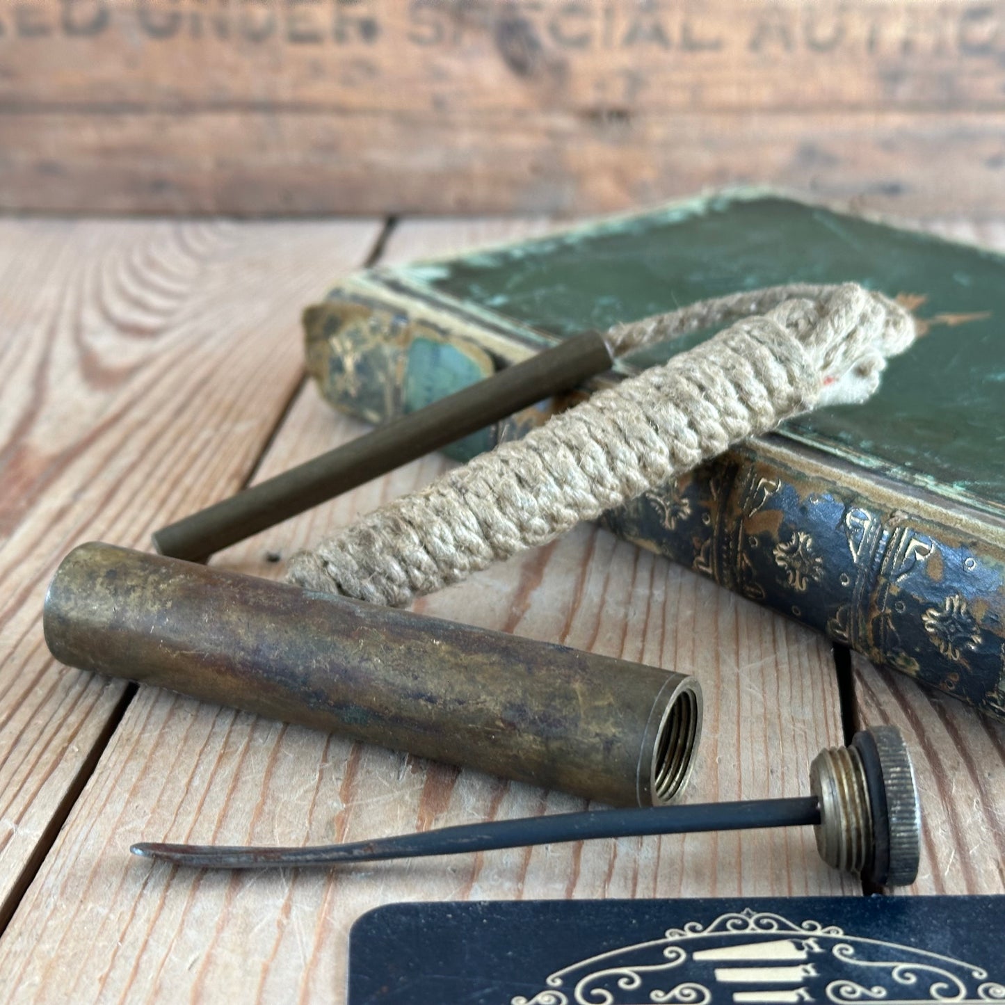 SOLD. H2257 Vintage WW1 SMLE Pull through and oil flask