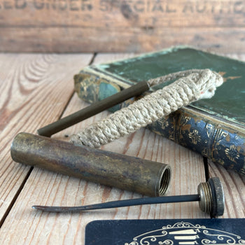 SOLD. H2257 Vintage WW1 SMLE Pull through and oil flask