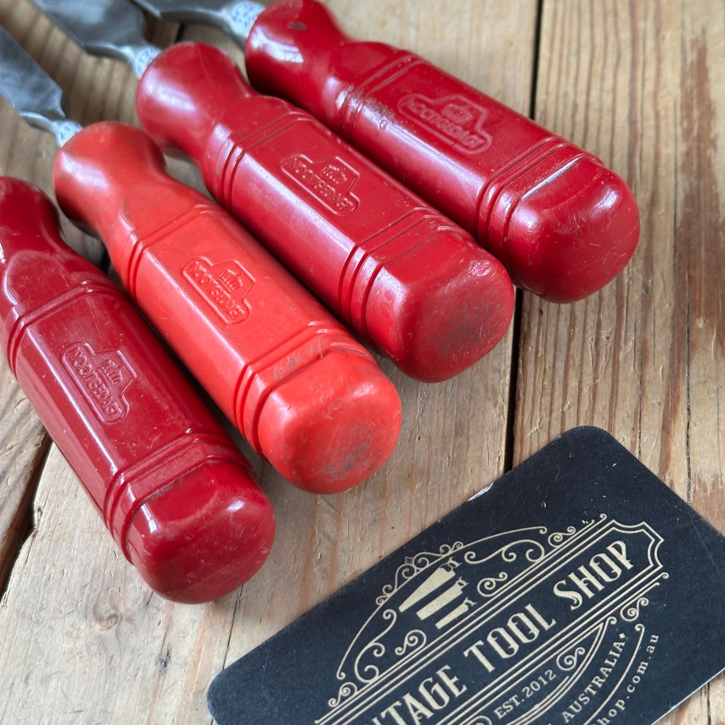 N1854 Vintage set of 4 NOOITGEDAGT Holland red resin handle BEVEL CHISELS