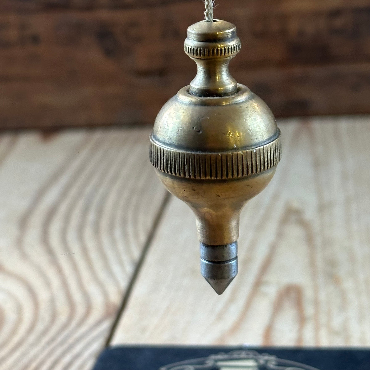 D1508 Vintage FANCY ORB shaped brass PLUMB BOB