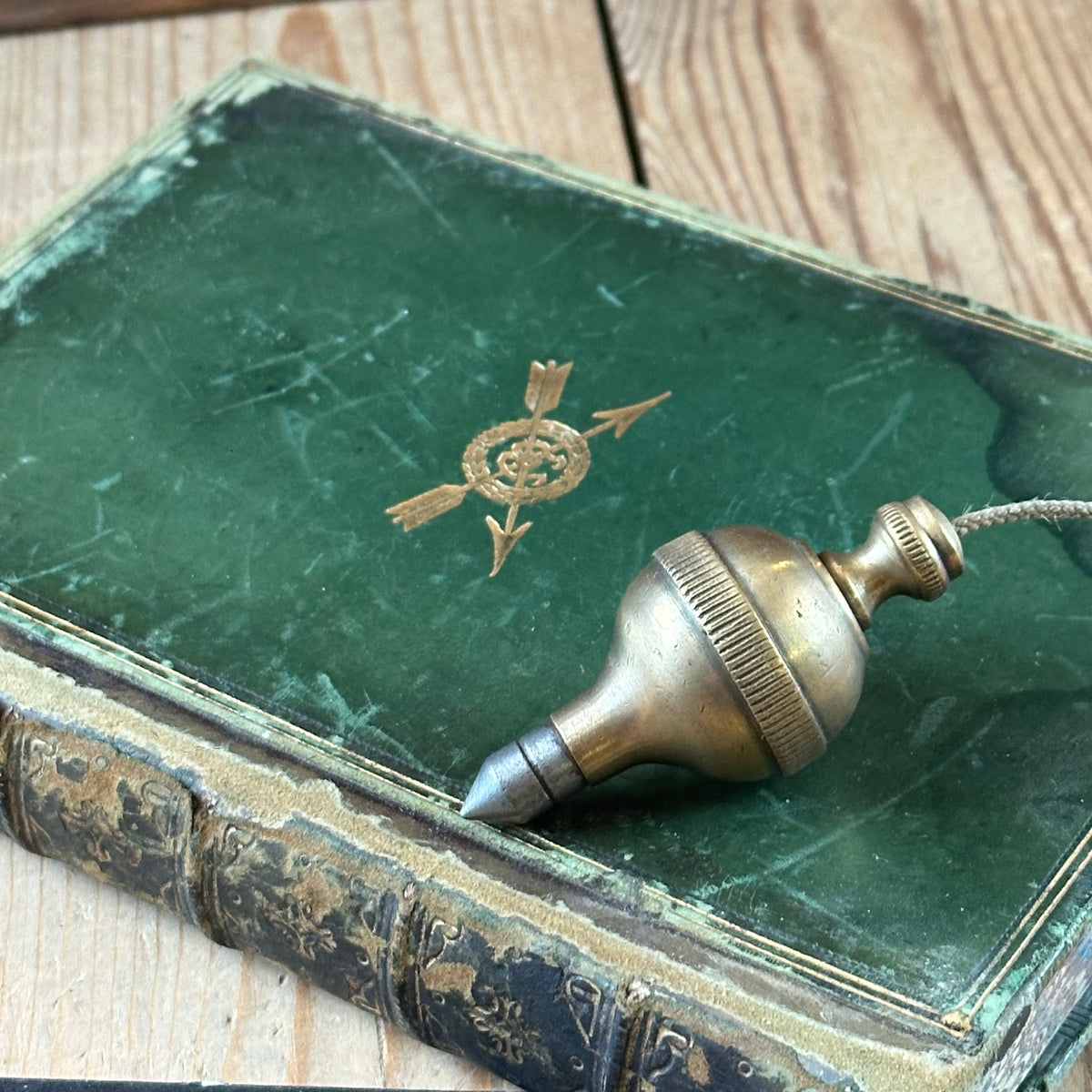 D1508 Vintage FANCY ORB shaped brass PLUMB BOB