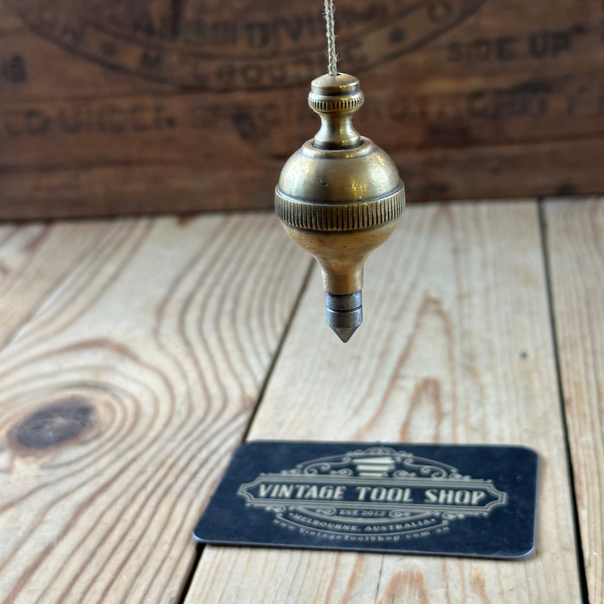 D1508 Vintage FANCY ORB shaped brass PLUMB BOB