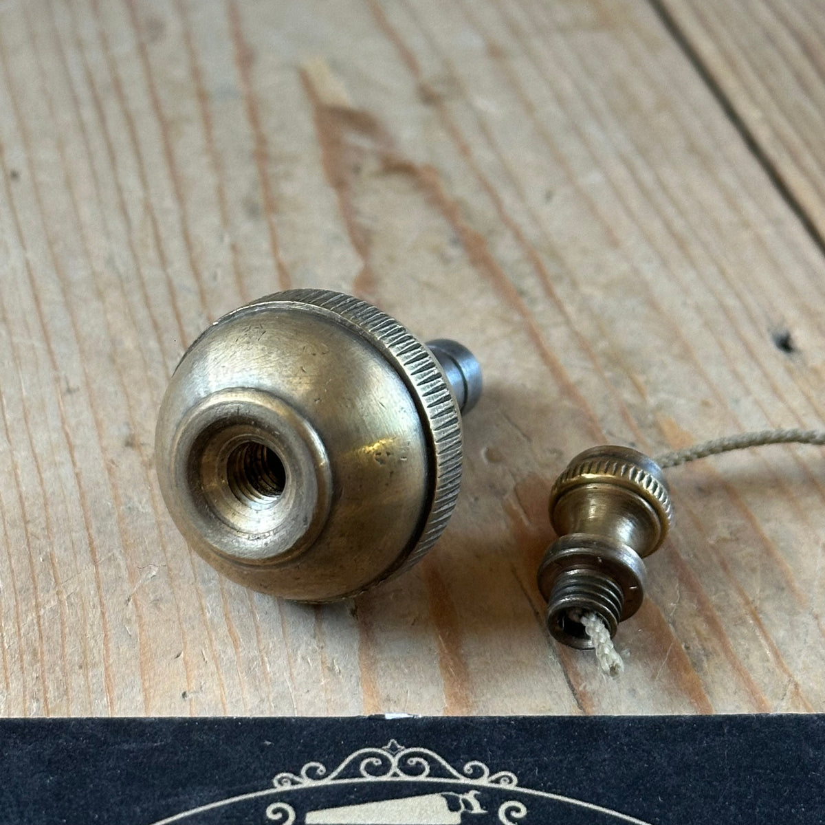 D1508 Vintage FANCY ORB shaped brass PLUMB BOB