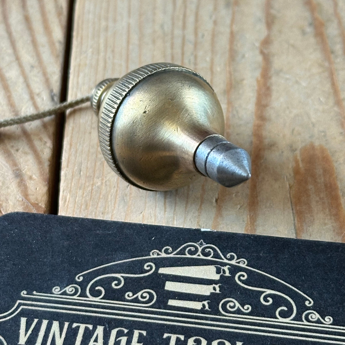 D1508 Vintage FANCY ORB shaped brass PLUMB BOB