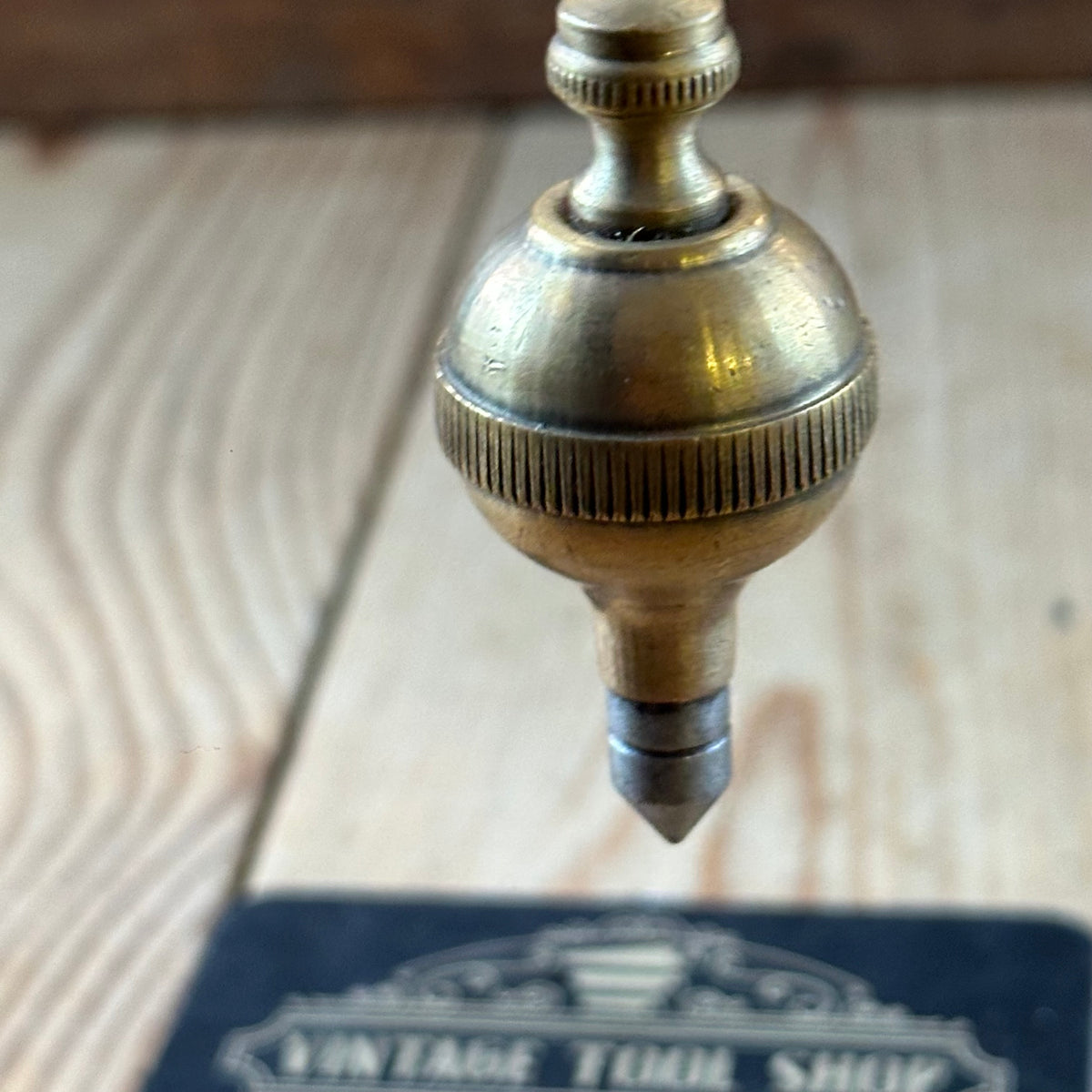 D1508 Vintage FANCY ORB shaped brass PLUMB BOB