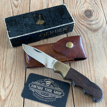 SOLD K18 Vintage GERBER USA folding MAGNUM HUNTER KNIFE with sharpening stone IOB